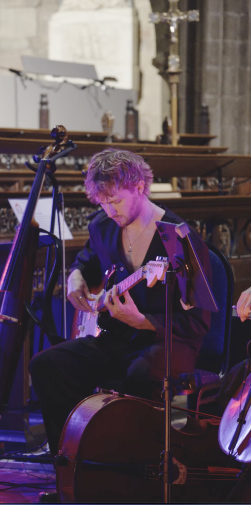 Josh playing Electric Guitar